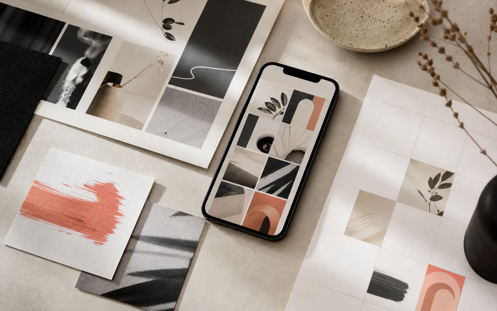 A mobile content grid, campaign board, and print samples arranged for social media planning.